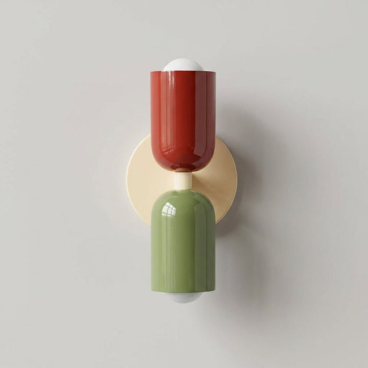 Detailed view of the metal frame and diffusing panel on the modern wall lamp.