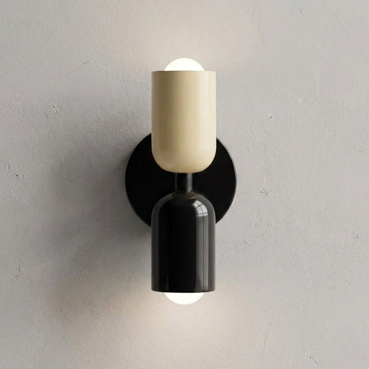 Stylish bedside lighting featuring a contemporary geometric wall lamp with soft glow.
