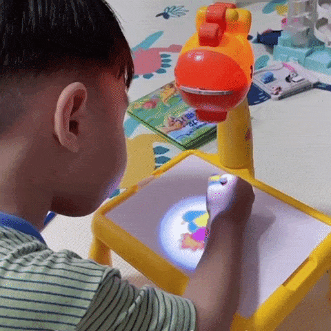 Back view of kids dinosaur art toys and projection drawing board
