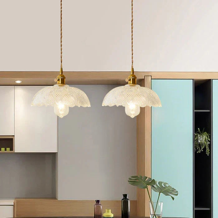 Architectural shot of the transparent glass pendant lamp during daylight