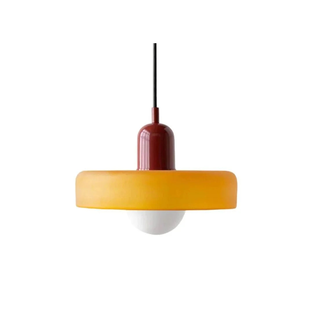 Close-up view of the adjustable drop pendant lamp with orange shade and white bulb diffuser