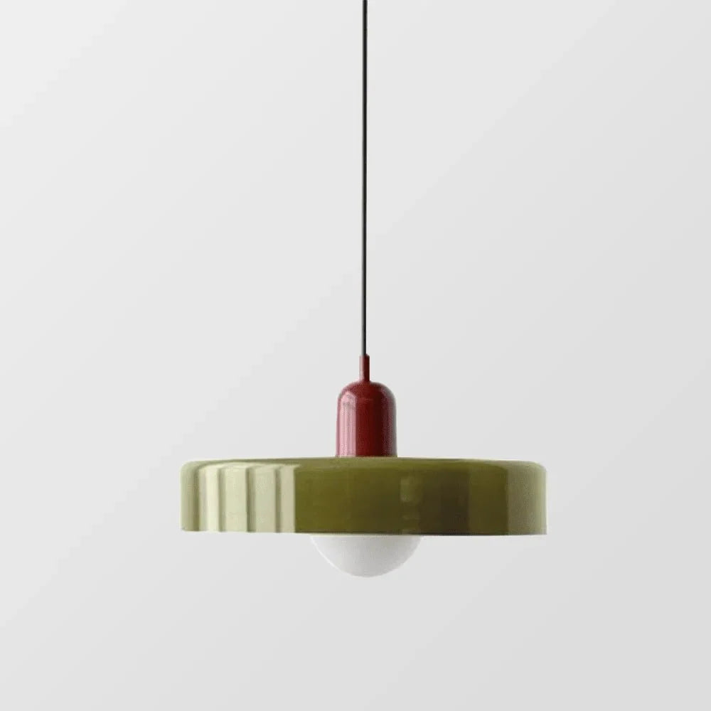 Clear glass pendant light reflecting natural light during daytime