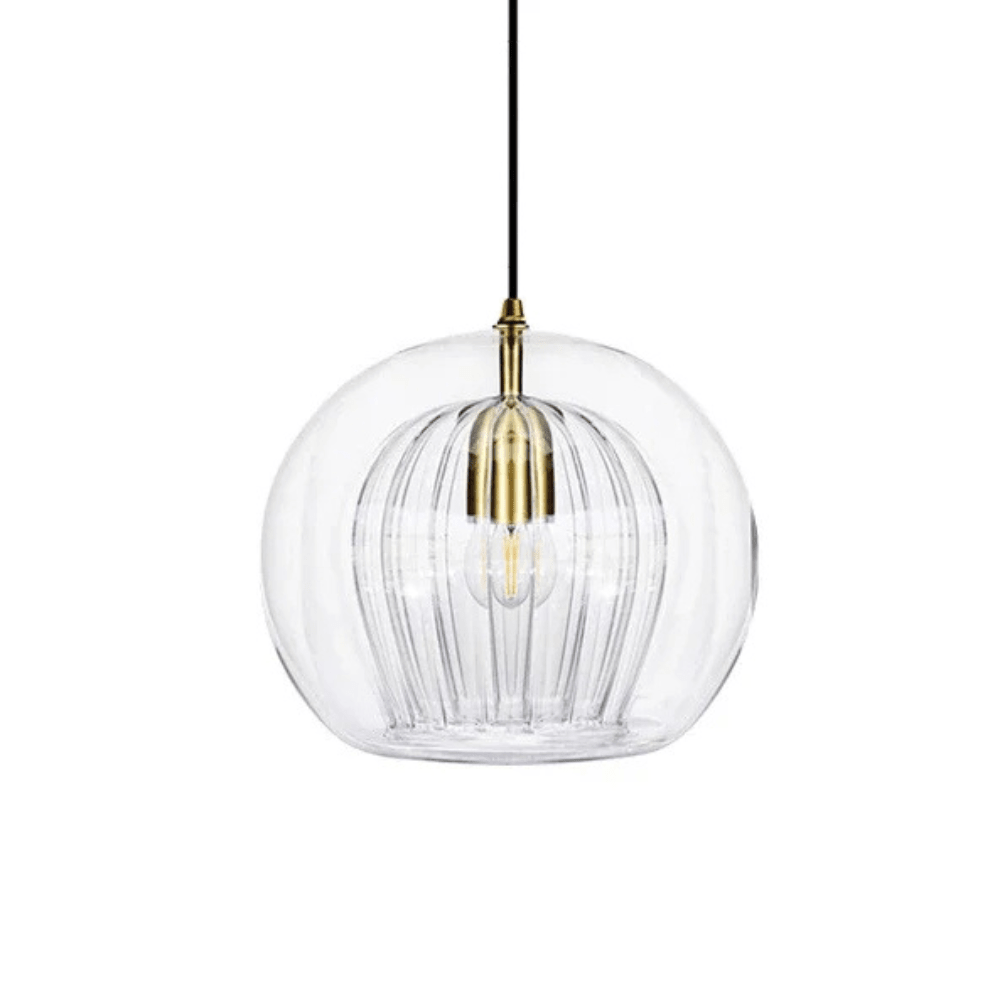 Minimalist lighting fixture casting a warm glow on countertops