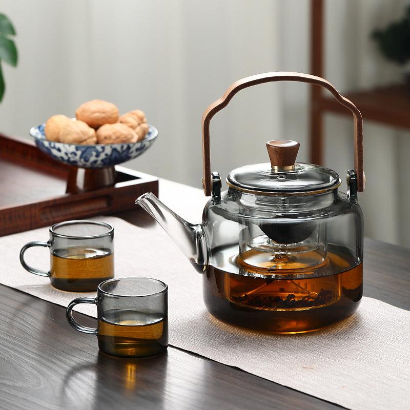 Smoked glass teapot with a fine mesh tea infuser for loose leaf tea