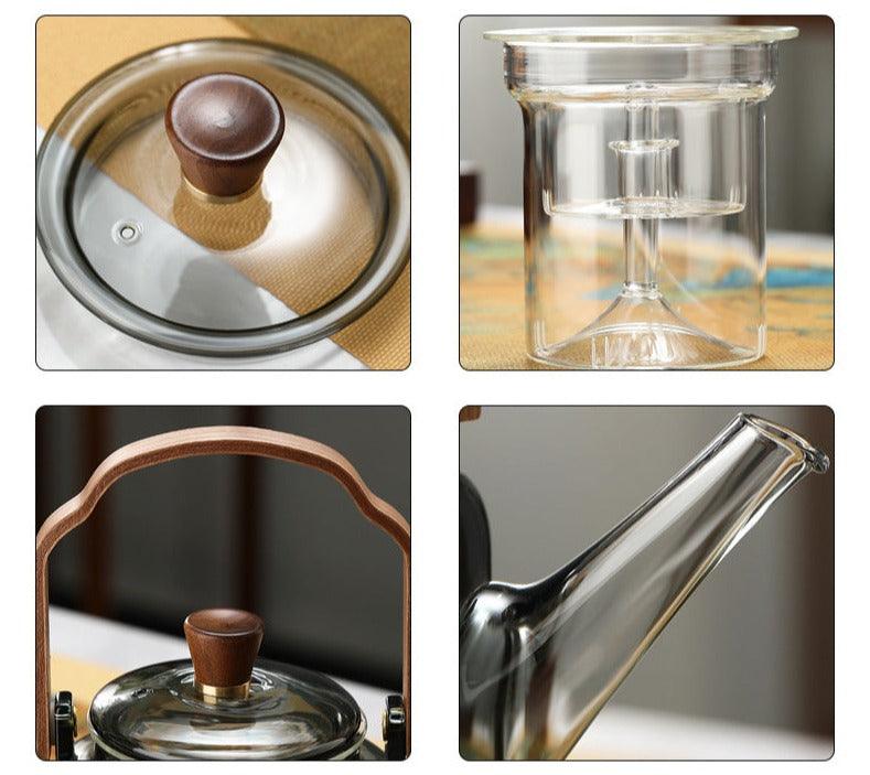 Close-up of the wooden lid and rim of the transparent glass teapot