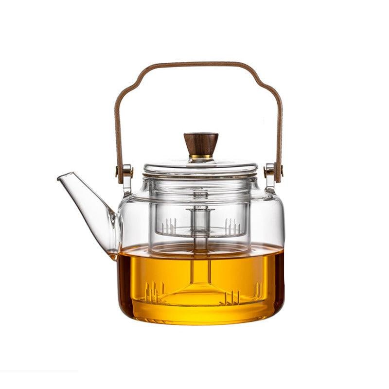 Gift-ready glass teapot with tea infuser and wooden lid on display