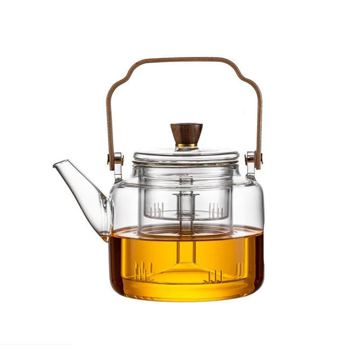 Gift-ready glass teapot with tea infuser and wooden lid on display