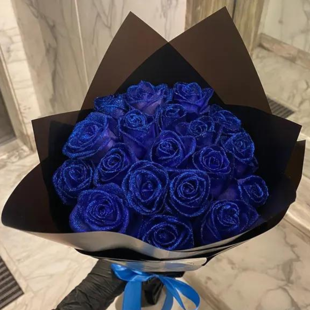 Close-up of vibrant blue glittering eternal rose heads in a bouquet arrangement