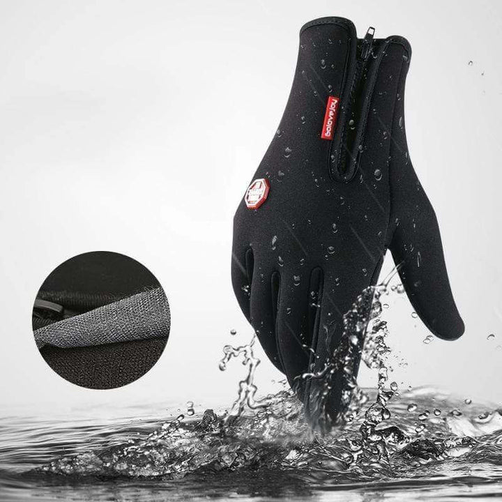 Waterproof thermal glove being splashed with water to demonstrate water resistance