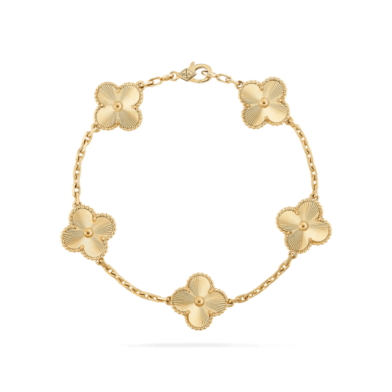 Textured gold-colored metal clover charm bracelet for women