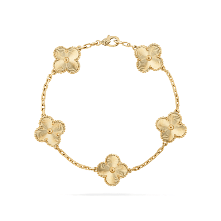 Textured gold-colored metal clover charm bracelet for women