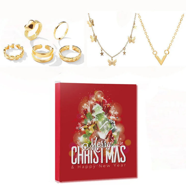 Close up of gold rings and butterfly necklaces from the advent calendar