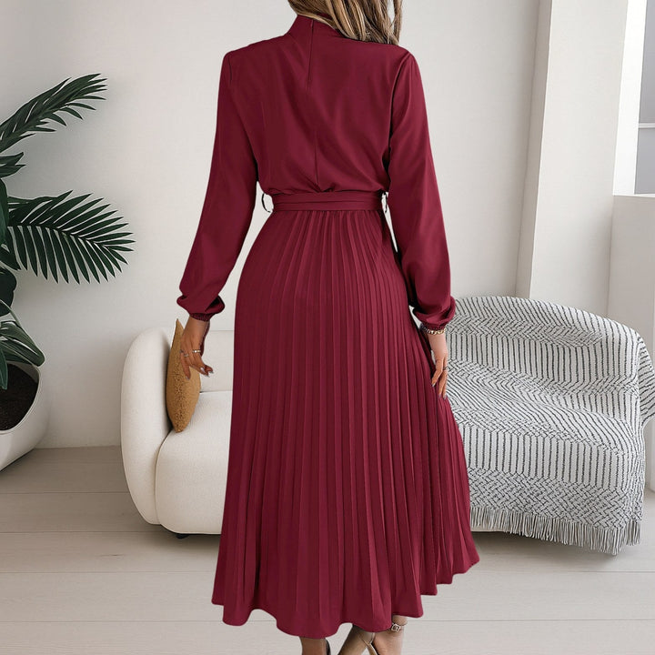 Sophisticated long sleeve pleated dress suitable for work or events