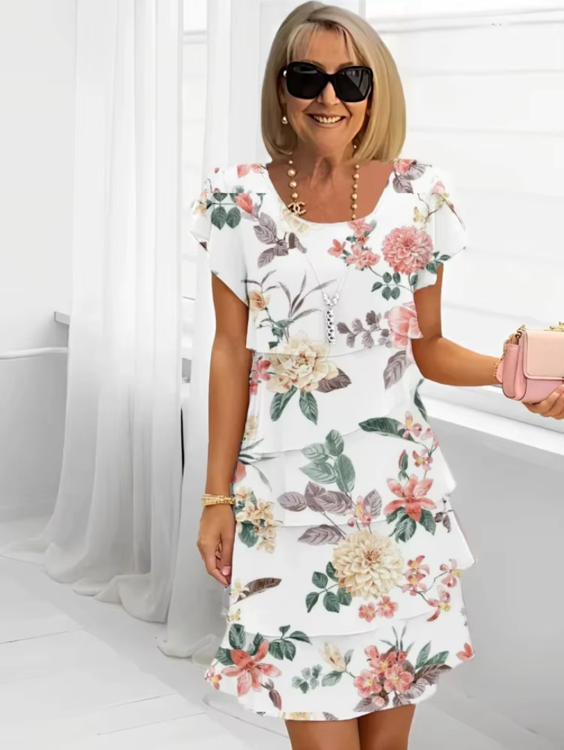 Close up of floral pattern and flutter sleeve on womens summer dress