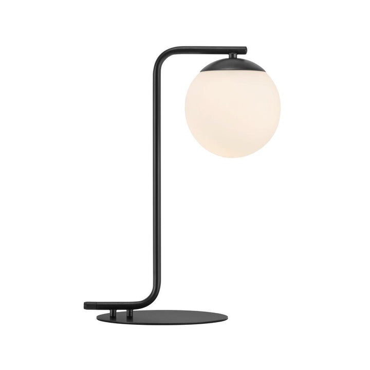 Studio shot of the minimalist black metal and glass table lamp