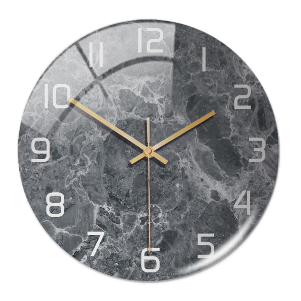 Contemporary marble-look timepiece hanging in a cozy living room setting to elevate your home decoration.
