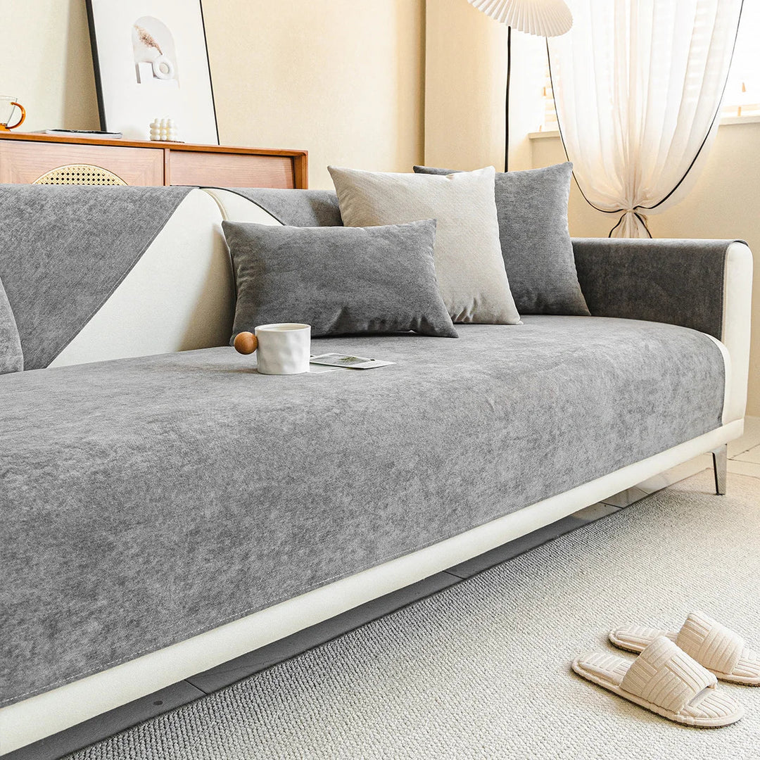 Gray non-slip sofa cover highlighting edge stitching and fine finish