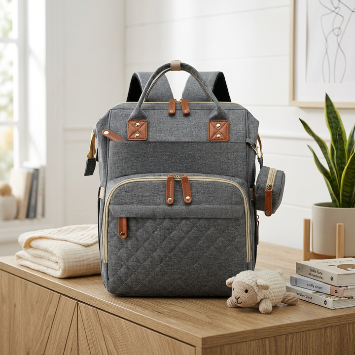 Parenting essentials bag worn by parent demonstrating ergonomic shoulder straps