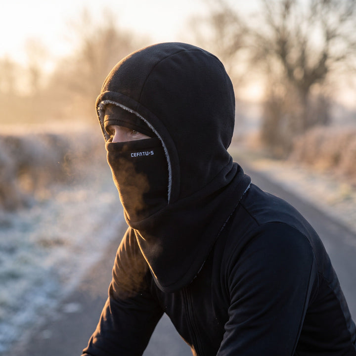Cyclist wearing the windproof 3-in-1 balaclava outdoors during a cold winter morning