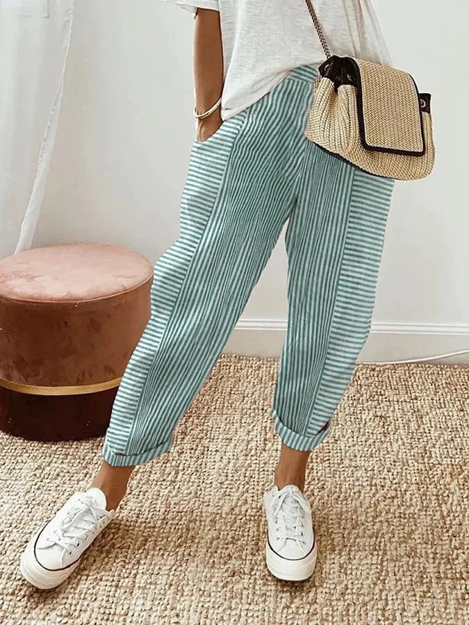 Back view of womens fashion relaxed fit trousers with striped pattern