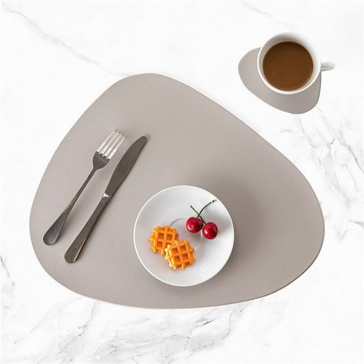 Water-resistant modern placemat set protecting dining table