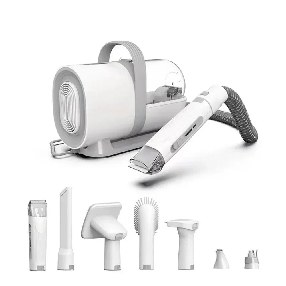 Professional pet grooming vacuum system with handheld clipper and attachment heads