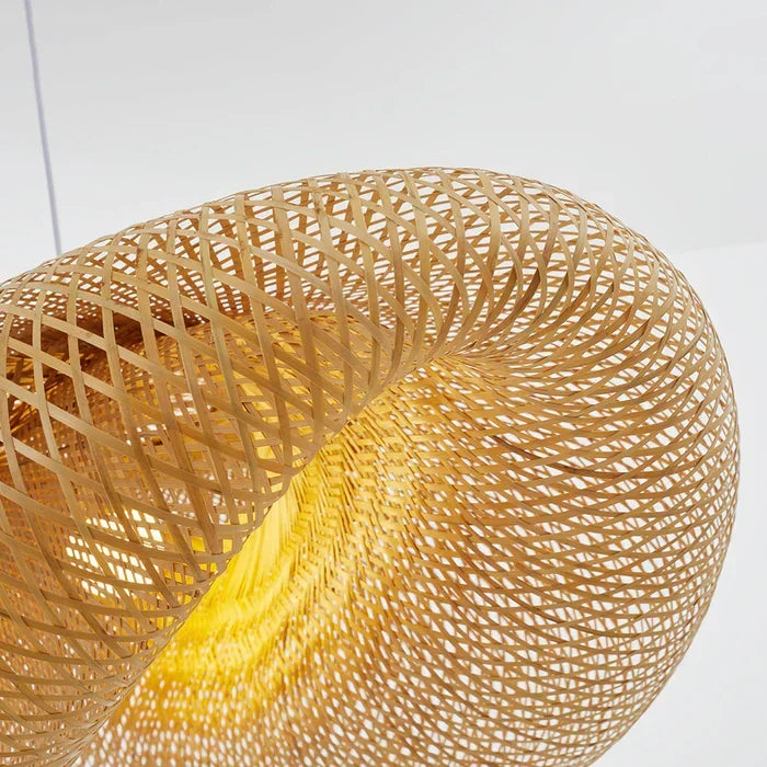 Sustainable bamboo ceiling lamp glowing softly in a cozy bedroom setting