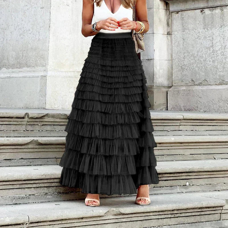 High-waisted tiered maxi skirt for women featuring a chic A-line ruffle design for summer fashion.