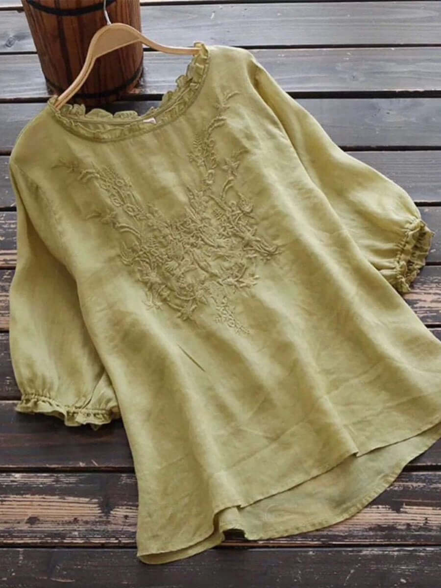 Casual long sleeve womens top with stylish ruffle trim details