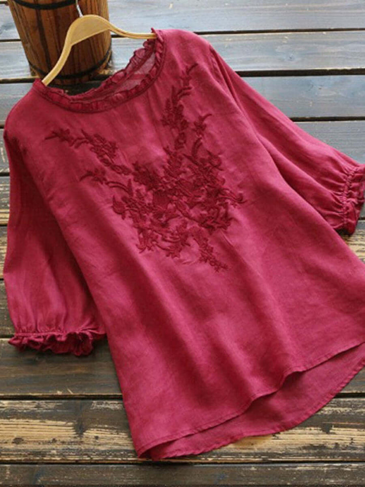Boho embroidered blouse back view highlighting relaxed fit