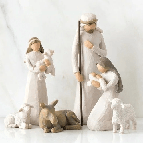 Wooden manger backdrop and rustic stable setup for holiday display