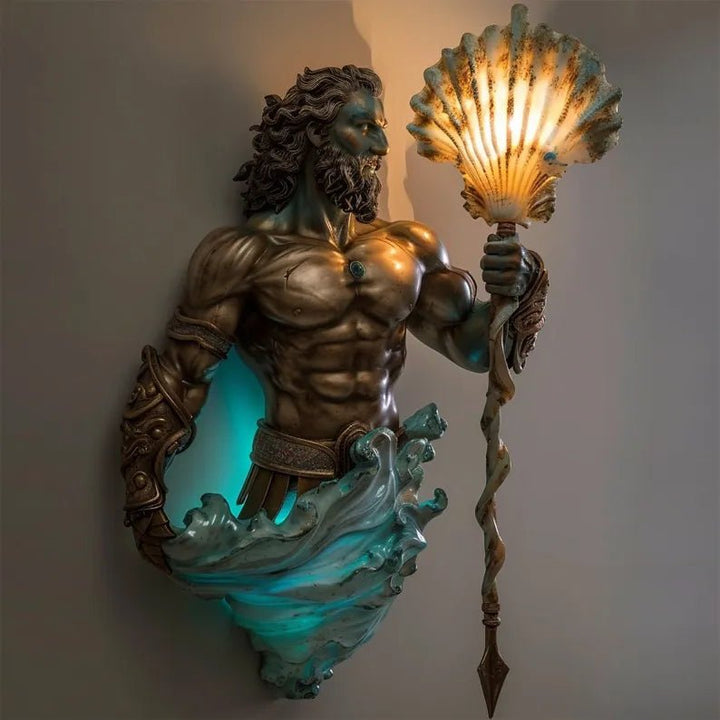 Poseidon wall sconce sculpture holding a glowing shell lamp with warm and turquoise lighting
