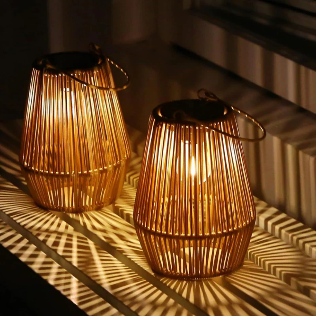 Waterproof outdoor lantern casting warm LED light on a garden table