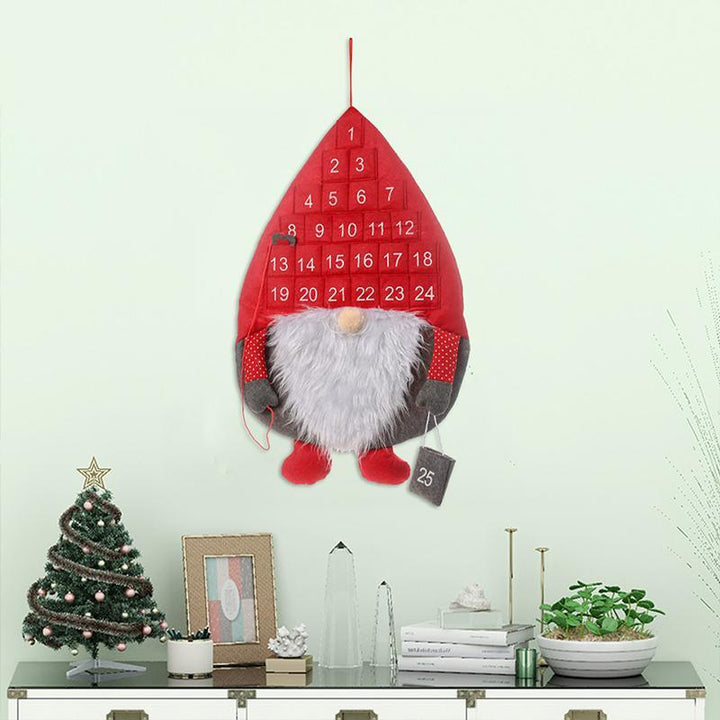 Close-up of festive Santa advent calendar pockets for daily countdown
