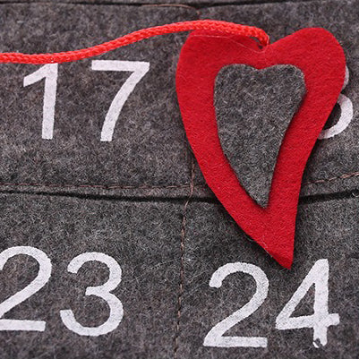 Festive home decor piece showing the full Santa Claus advent banner