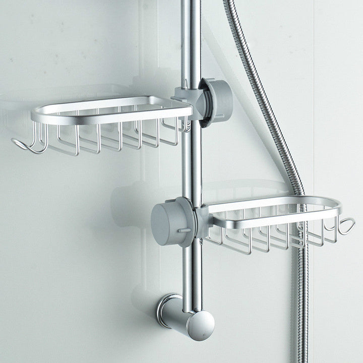 Dual silver hanging shower soap dishes mounted on a bathroom shower rail system