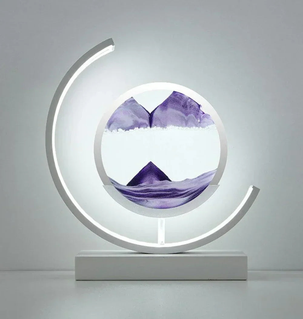 Harmony Sand Landscape Lamp glowing softly on a desk