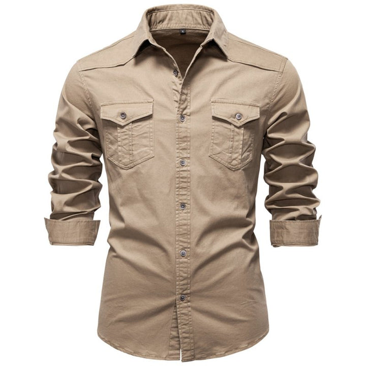 Model wearing men's utility overshirt with casual trousers