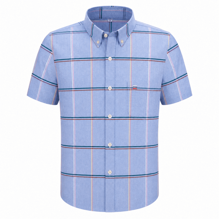 Model wearing men's short sleeve button-down shirt in outdoor setting