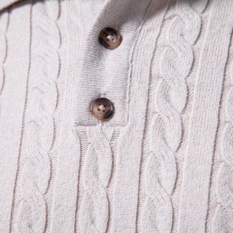 Collar detail and button closure of men's smart casual cable knit shirt