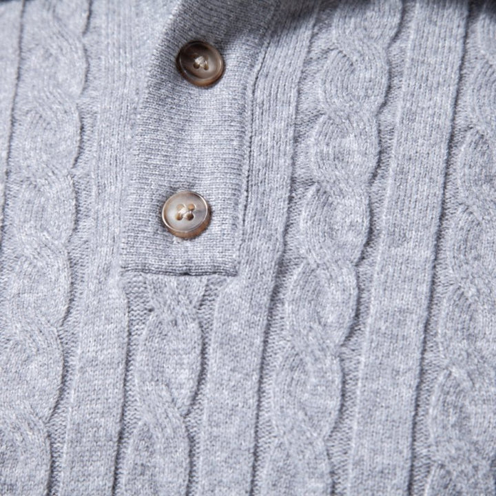 Sleeve cuff detail on a men's cozy winter style cable knit polo