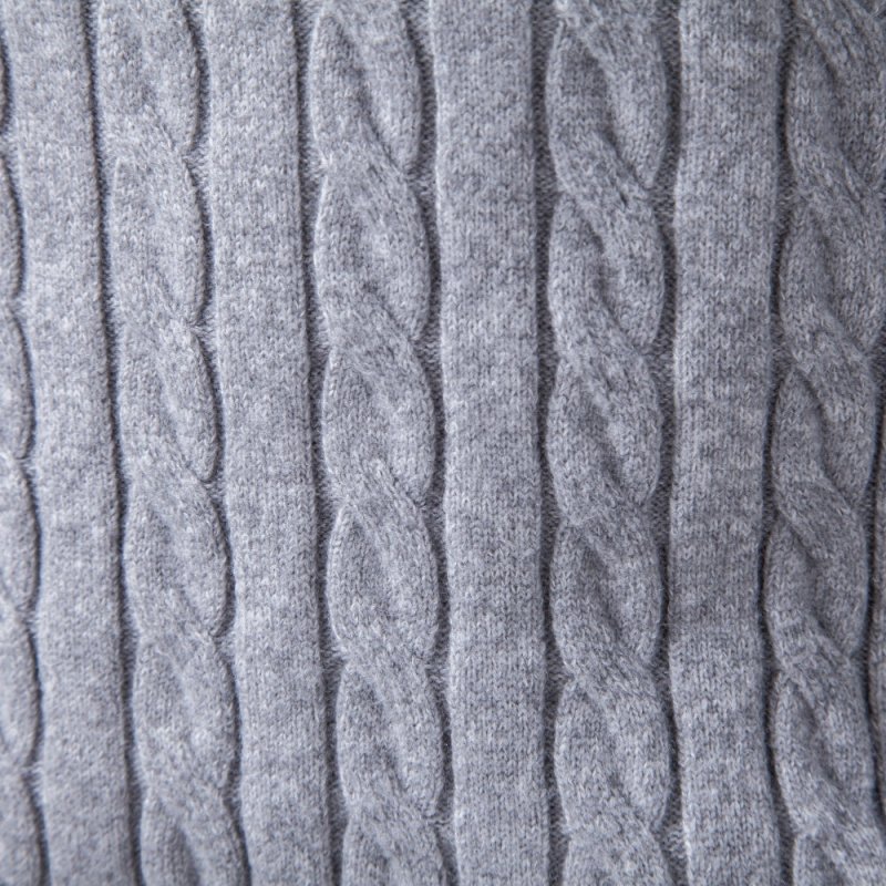 Lifestyle view of men's cable knit long sleeve polo shirt for cool weather