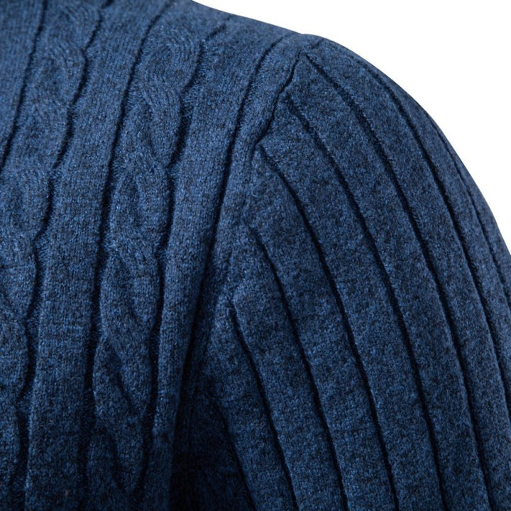 Textured weave pattern close-up on a men's long sleeve knitted polo top