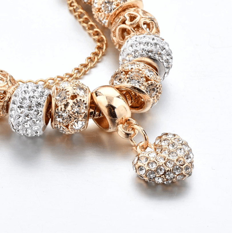 Macro detail shot of the sparkling crystal heart charm and beads