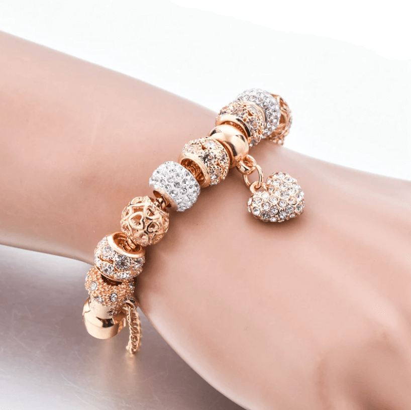 Womens gift idea gold crystal heart charm bracelet wrist shot
