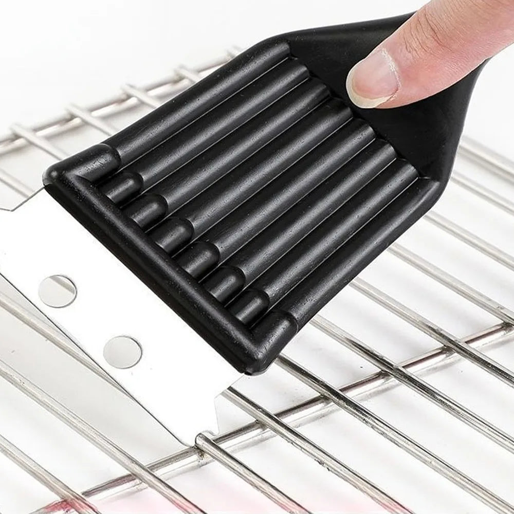 Essential barbecue cleaning tool resting on a clean metal grill ready for outdoor cooking