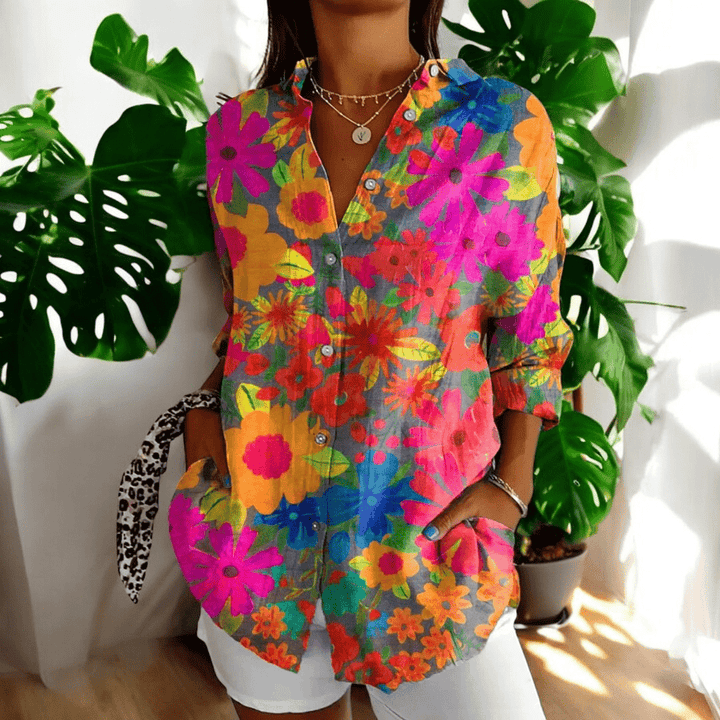 Detailed shot of the v-neck collar on a womens resort wear shirt
