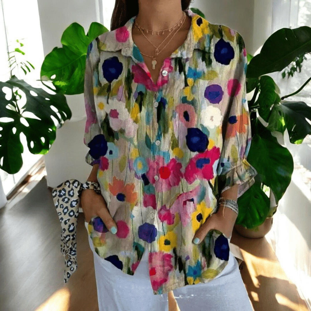 Womens resort wear floral top featuring a stylish v-neck collar