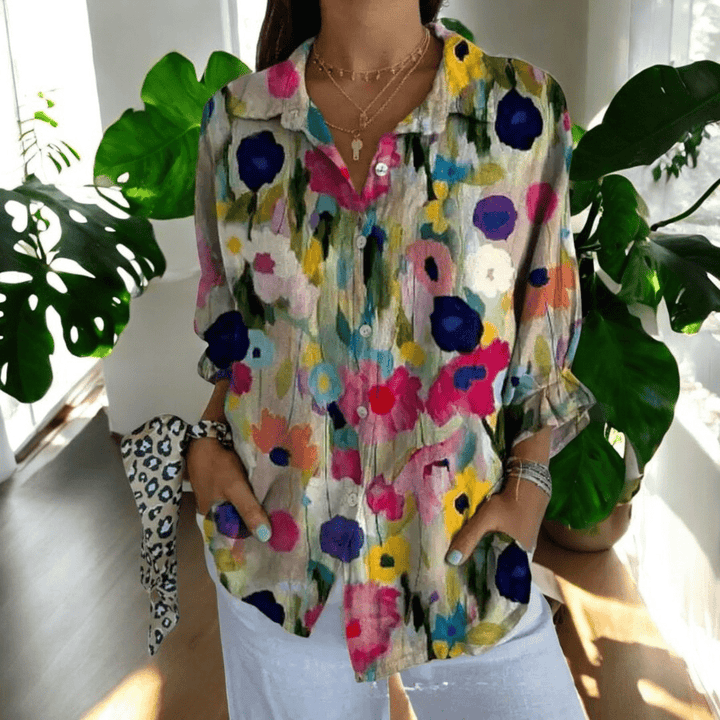 Womens resort wear floral top featuring a stylish v-neck collar