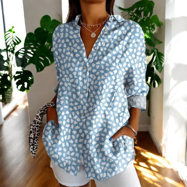 Close-up of the floral pattern on a womens casual wear blouse